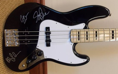 Band-Autographed Geddy Lee Jazz Bass Fetches Over $10,000 For Charity